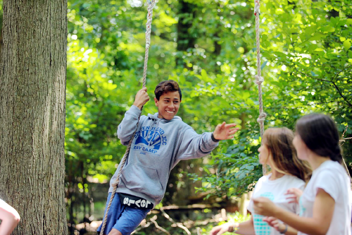 Andrea Uribe with their foster-children Ethan, 13, Julian, 6, and dog Lu, at their Huguenot home. (Staten Island Advance/Alexandra Salmieri)